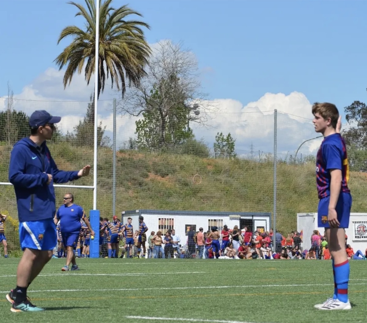 Àlex Català on the rugby pitch with his coach